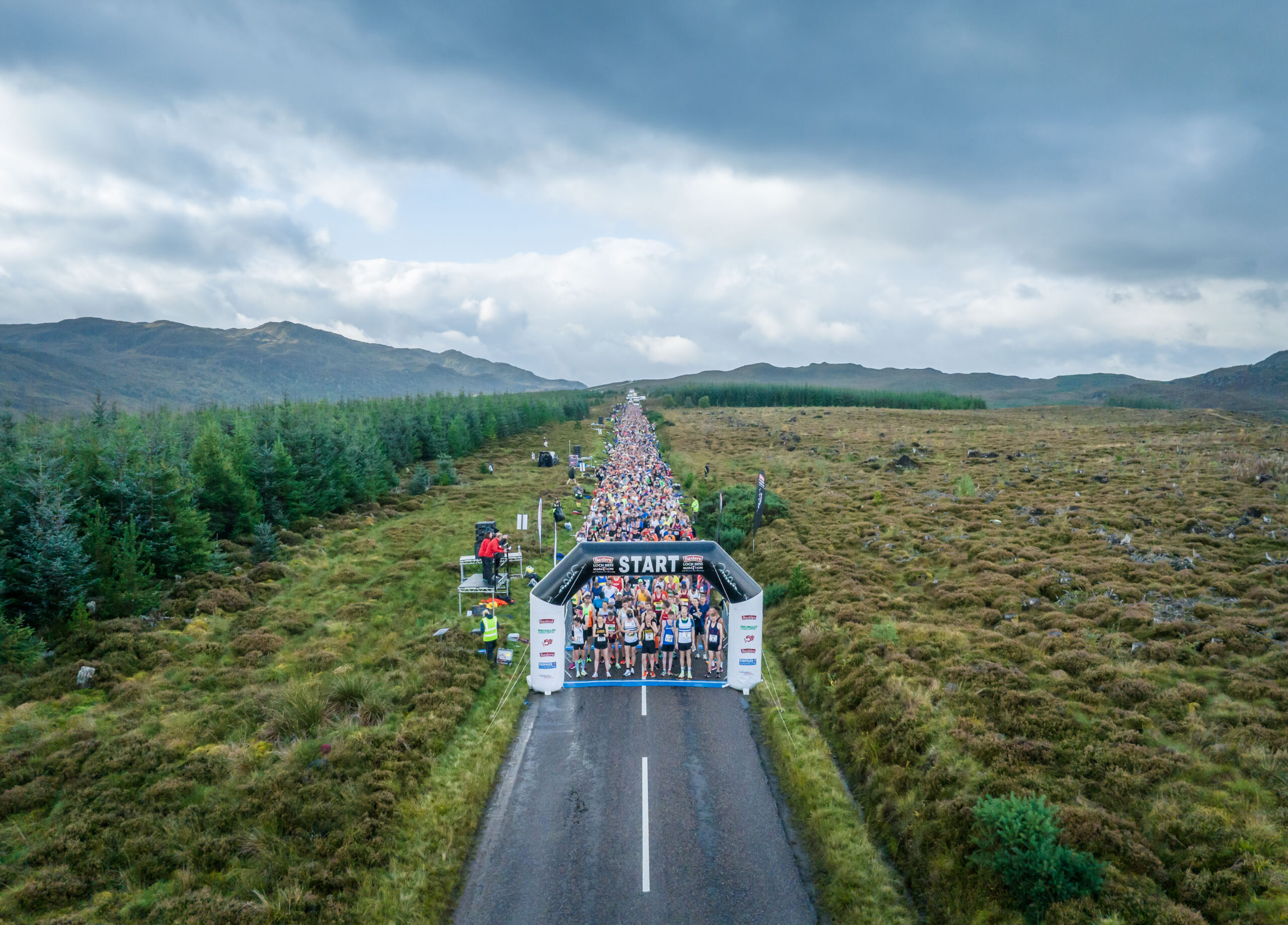 Runners on the Loch Ness marathon course 