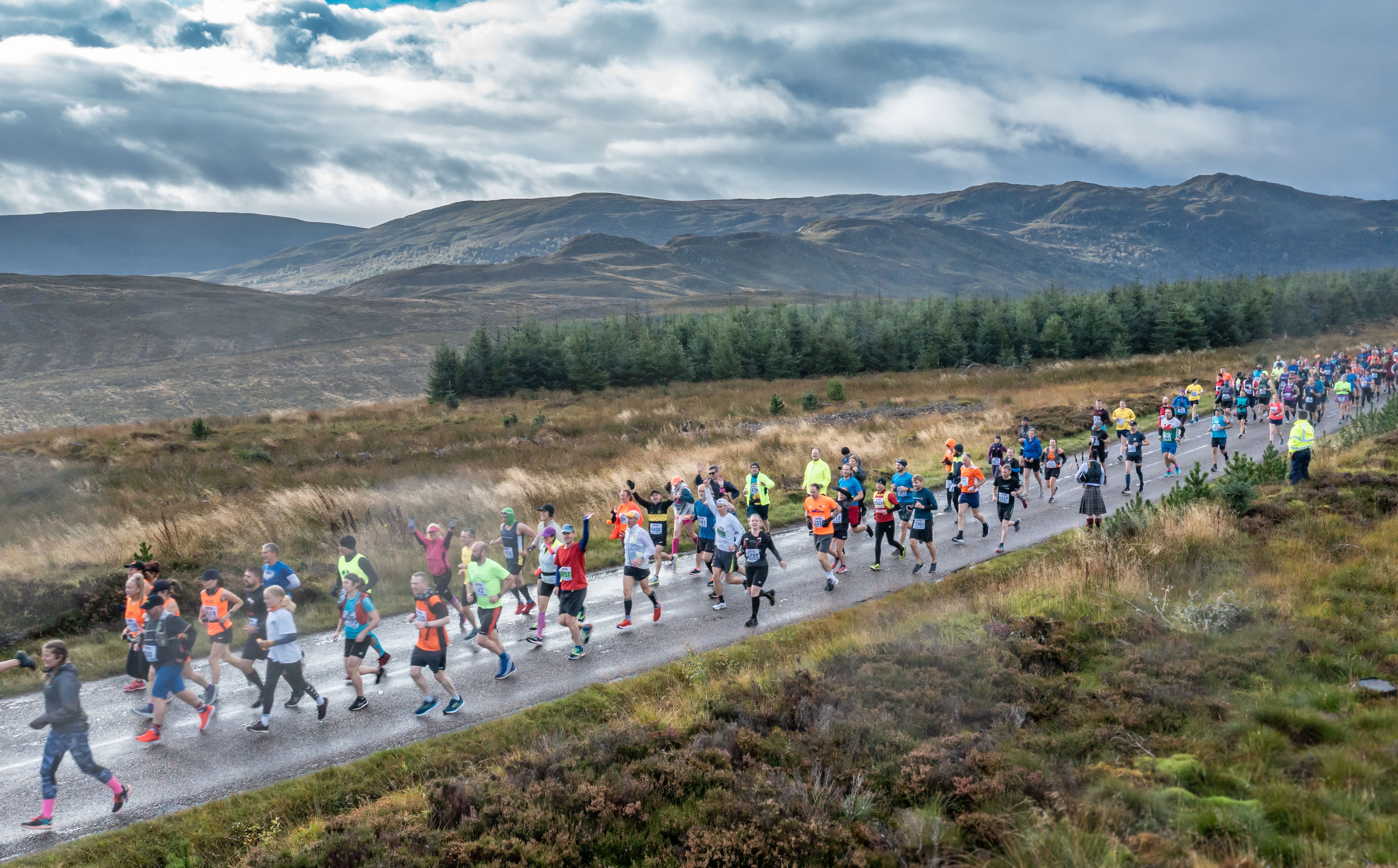 Runners on the Loch Ness marathon course 